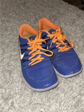 Nike' Blue Athletic Shoes with Orange Laces